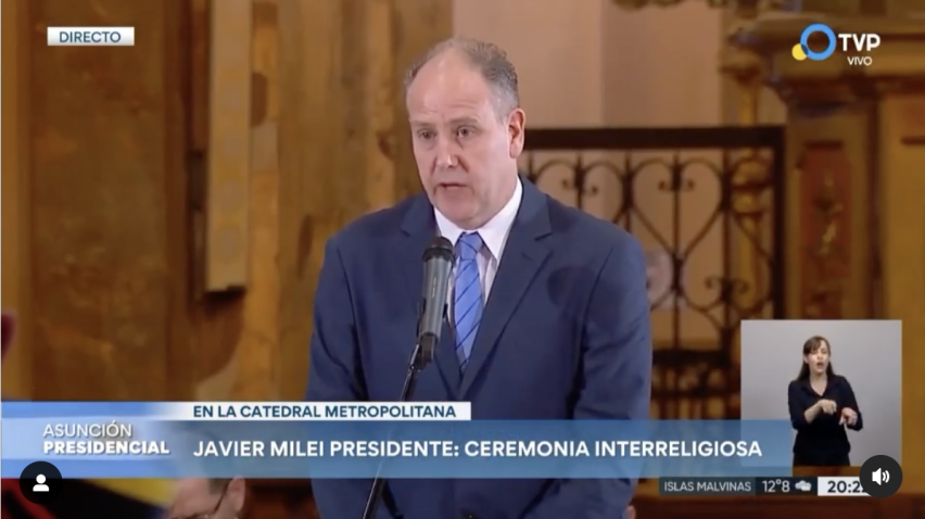 ACIERA President speaking at inter-religious ceremony with President