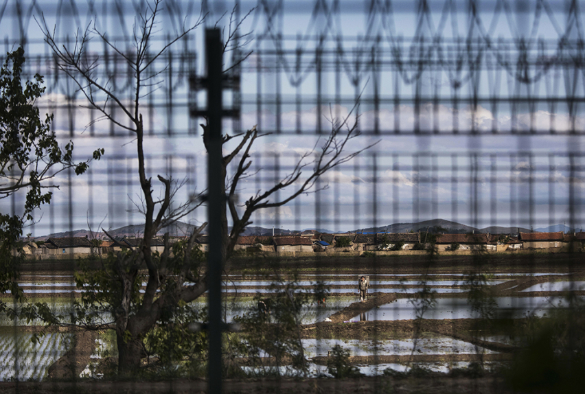 China North Korea border with fence