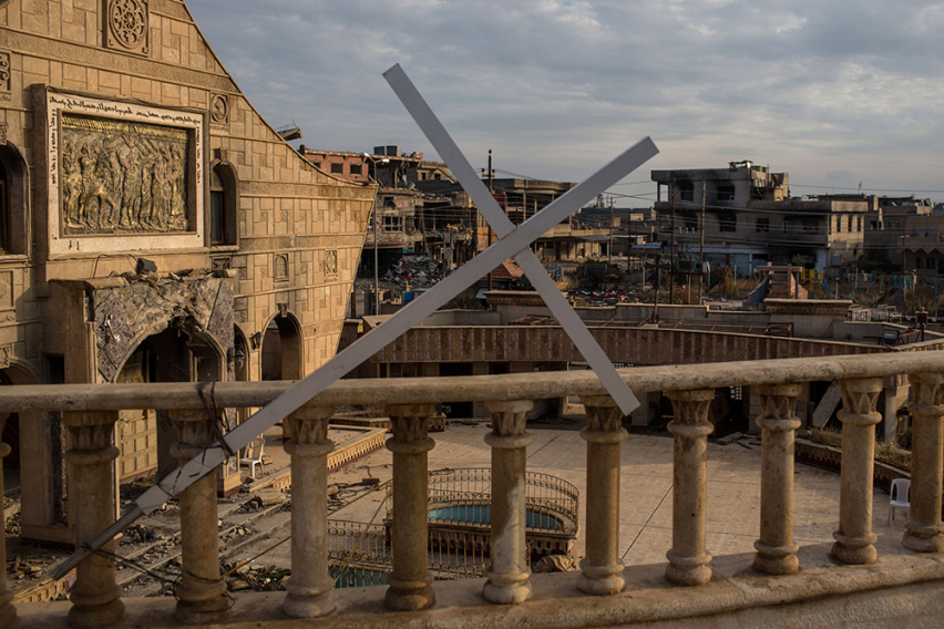 Church burnt by ISIS with cross on roof in Qaraqosh Iraq