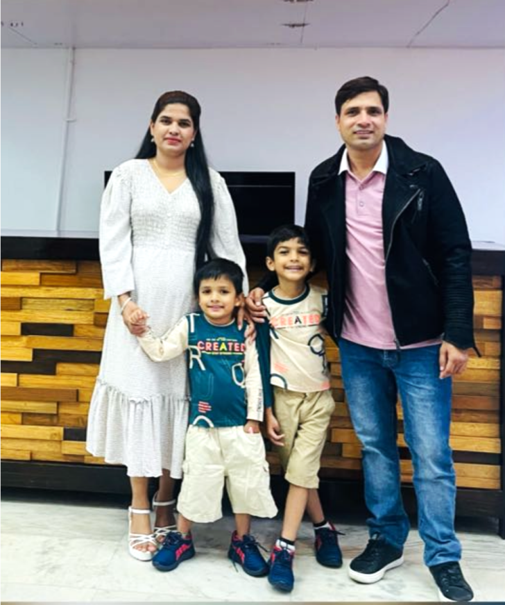 Pastor Keshab Raj Acharya with wife and children.