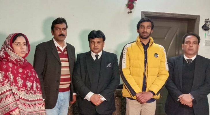 Ashbeel Ghauri (2nd from right) with lawyers and parents on March 14, 2024.