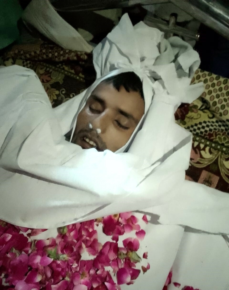 Shahid Masih, assaulted in May 2024 in Sheikhupura District, Pakistan, before his burial.