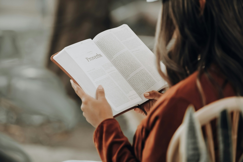 Woman reading Bible