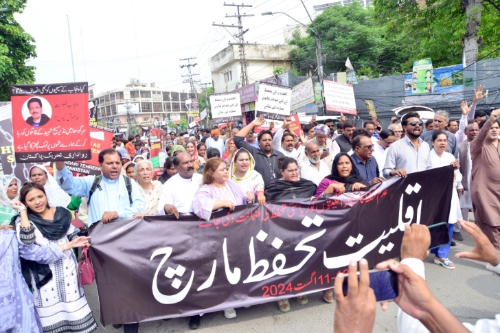 Minorities at rally shout slogans outside the Lahore Press Club on Aug. 11, 2024.