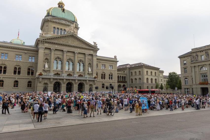 1,000 remember the persecuted at Switzerland protest: mass grave, wooden crosses and survivors’ stories