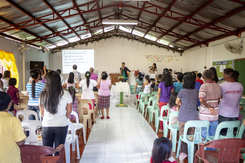 A worship service at a local church in Manila, Philippines.