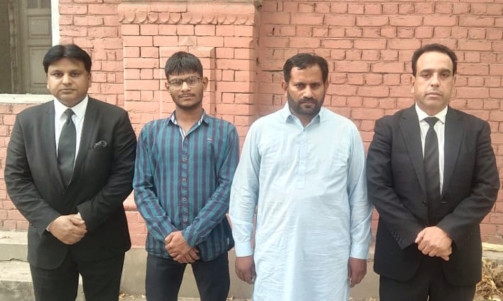 Dawood William (2nd from left) and Shahid Aftab (3rd from left) with attorneys after they were acquitted of blasphemy charges on April 18, 2025.