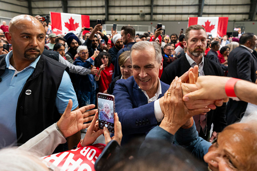 Prime Minister of Canada and Liberal Party Leader Mark Carney greets supporters