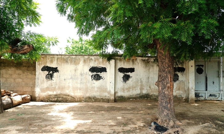 Boko Haram insignia is blacked out on walls in Bama, Borno state Nigeria.