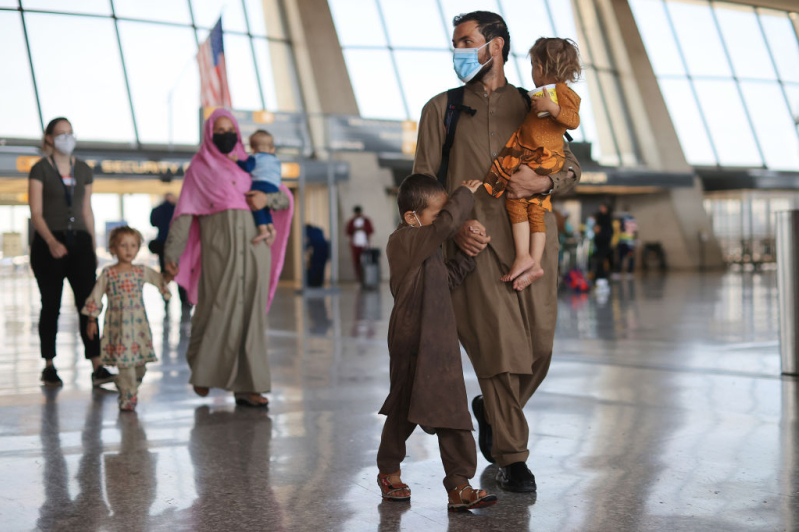 Refugees arrive at Dulles International Airport