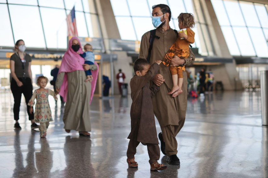 Refugees arrive at Dulles International Airport