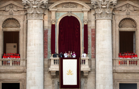 The newly elected Pontiff, Pope Leo XIV is seen for the first time from the Vatican balcony on May 8, 2025 in Vatican City, Vatican