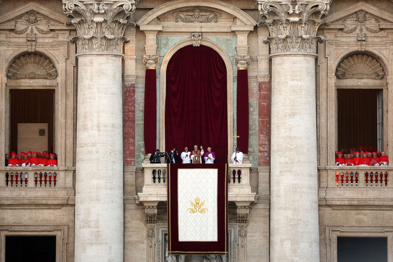 The newly elected Pontiff, Pope Leo XIV is seen for the first time from the Vatican balcony on May 8, 2025 in Vatican City, Vatican