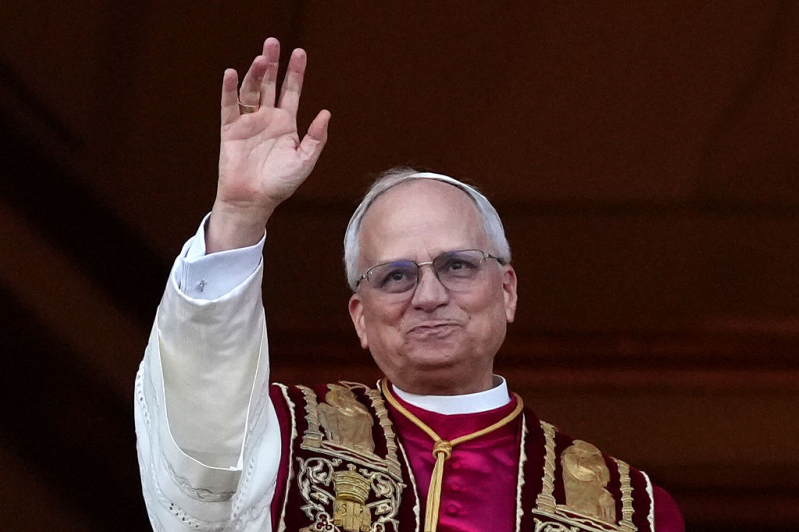 The newly elected Pontiff, Pope Leo XIV is seen for the first time from the Vatican balcony on May 8, 2025 in Vatican City, Vatican.