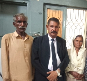 Attorney Hanif Hameed flanked by parents of 15-year-old girl kidnapped and forcibly converted and married in Pakistan.