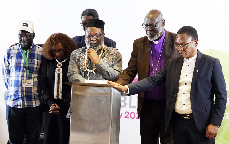 Rev. Dr. Jean Libom Li Likeng, newly elected president of the Association of Evangelicals in Africa (AEA), leads a prayer of commissioning for the second edition of the Africa Bible Commentary during the 13th AEA General Assembly in Nairobi, Kenya