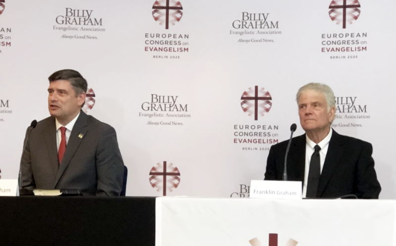 Will Graham (left), pictured with his father Franklin, speaking at the press conference for the European Congress on Evangelism organized by the Billy Graham Evangelistic Association.