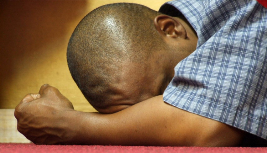 African Man in Godly Petition
