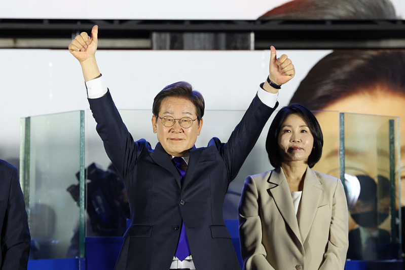 Lee Jae-myung, the presidential candidate of the Democratic Party and his wife Kim Hea-Kyung celebrate in front of the National Assembly on June 04, 2025 in Seoul, South Korea
