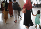 Refugees arrive at Dulles International Airport