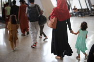 Refugees arrive at Dulles International Airport