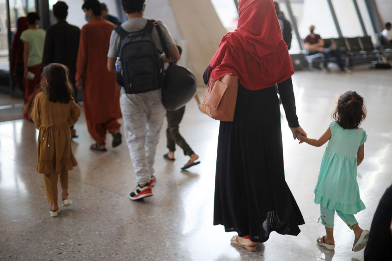 Refugees arrive at Dulles International Airport