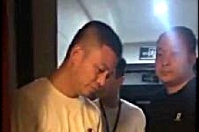 Police check ID cards of Beijing Zion Church members in Jiaxing, Zhejiang.