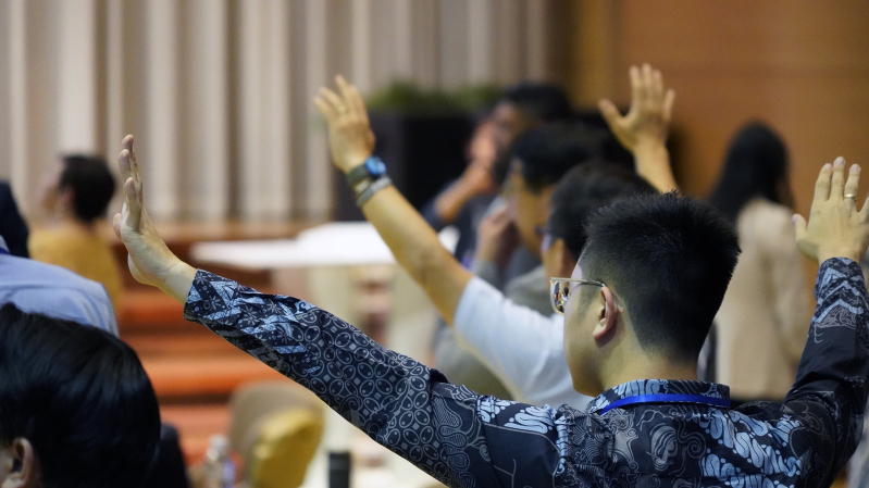 Participants join in worship during the opening session of the Asia Evangelical Leadership Forum in Seoul.