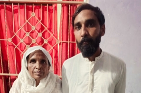 Farhan Javed Masih with mother after his release from prison on June 12, 2025.