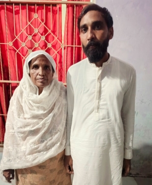 Farhan Javed Masih with mother after his release from prison on June 12, 2025.