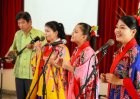 A Japanese-Peruvian family sings during a worship at a Japanese church in Peru.