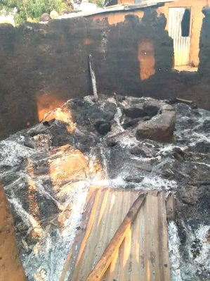 Remains of home set aflame in Unguwar Rogo village, Kajuru County, Nigeria, on Jan. 1, 2025.