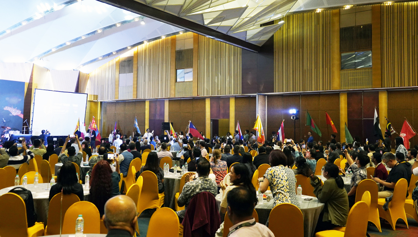 Delegates representing 22 nations carry their flags during the opening ceremony of the Arise Leadership Summit 2025, symbolizing unity and shared commitment to global missions.