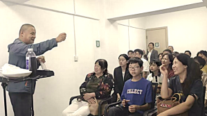 Pastor Ma Chao with remant house church in Guangzhou, China.
