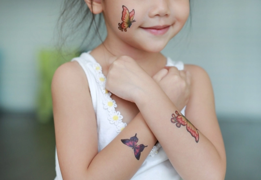 girl with tattoo stickers