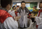 A Chinese Christian man stands after being baptized by a pastor during a ceremony at an underground independent Protestant church on October 12, 2014 in Beijing, China. According to the widest definition used by researchers, China is home to the largest e