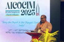Vijayesh Lal, General Secretary of the Evangelical Fellowship of India, welcomes nearly 450 participants to the opening session of AICOCIM 2025, calling the gathering a “kairos moment” for the Indian Church.
