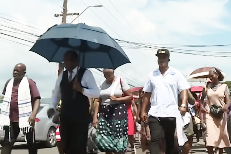 Protesters march in Spanish Town, St. Catherine, on Wednesday, joining church leaders in opposition to efforts to decriminalize obeah in Jamaica.
