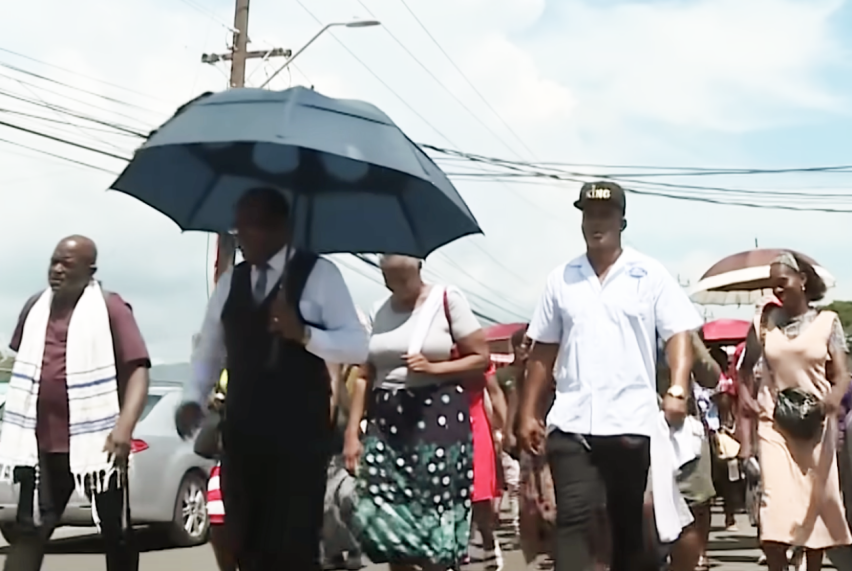 Protesters march in Spanish Town, St. Catherine, on Wednesday, joining church leaders in opposition to efforts to decriminalize obeah in Jamaica.