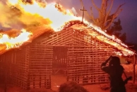 ISMP on Sept. 30 released 20 photos purporting to show members killing Christians.