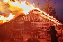 ISMP on Sept. 30 released 20 photos purporting to show members killing Christians.