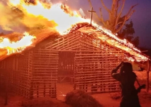 ISMP on Sept. 30 released 20 photos purporting to show members killing Christians.