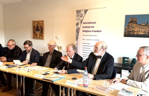 Thomas Schirrmacher, president of the International Society for Human Rights (ISHR), with panel of rights experts presenting 2025 yearbooks on religious freedom.
