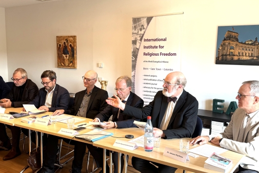 Thomas Schirrmacher, president of the International Society for Human Rights (ISHR), with panel of rights experts presenting 2025 yearbooks on religious freedom.