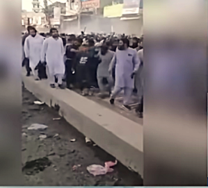 Tehreek-e-Labbaik Pakistan (TLP) members on Oct. 13, 2025 march in protest of Israeli-Hamas ceasefire.