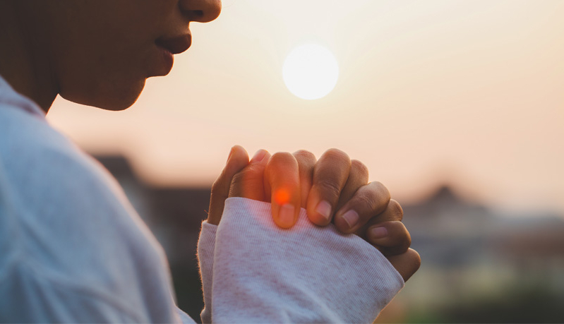 Praying stranger