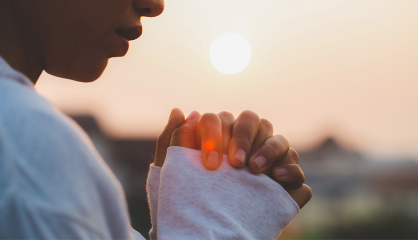 Praying stranger