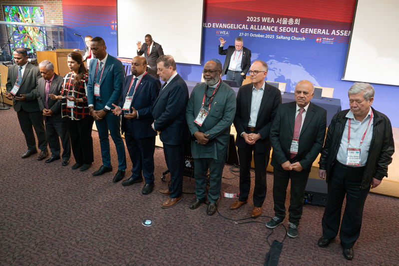 Delegates pray for the newly elected International Council during the World Evangelical Alliance General Assembly in Seoul, Korea, on Oct. 30, 2025.