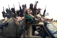 Screenshot from a video shows armed militants in Nigeria. The extremist group Boko Haram, along with Islamic State affiliates and Fulani militant herders, has been responsible for widespread attacks on Christian communities.