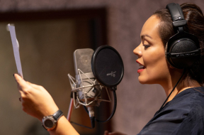 Rita performing the word